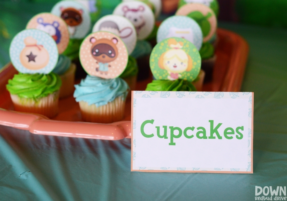 Closeup of the cupcakes food card for the Animal Crossing birthday party.