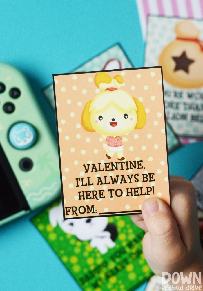 A tall image of a child holding a valentine that says "Valentine, I'll always be here to help!" on it.