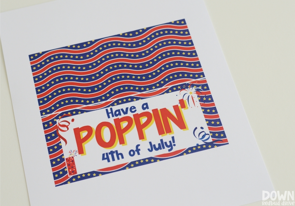 The printable tag for a 4th of July party favor that says "Have a Poppin' 4th of July".