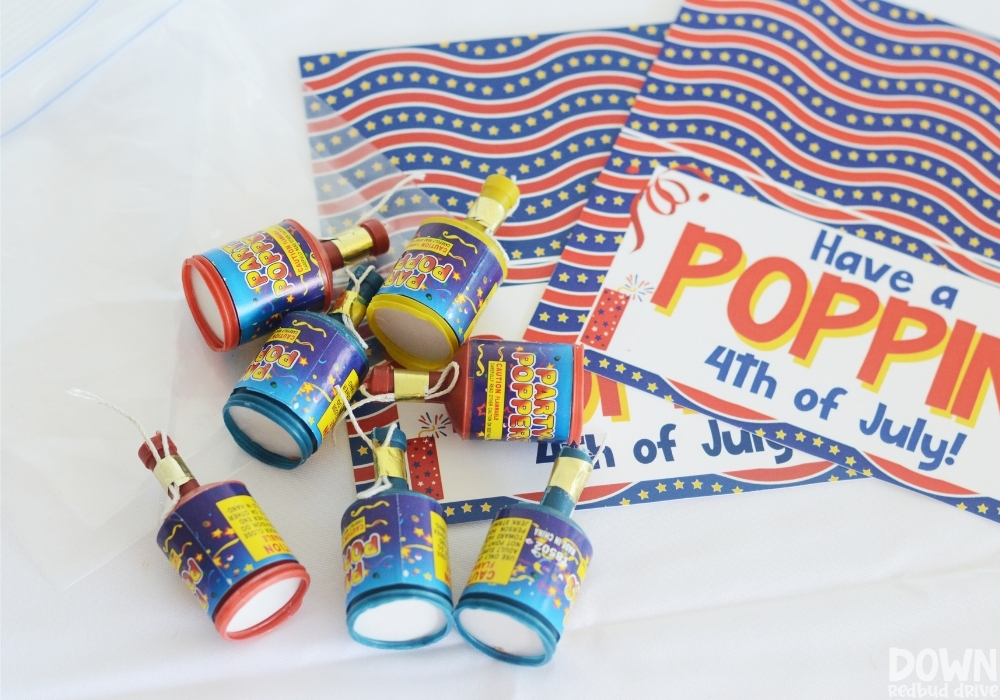 The supplies for the 4th of July party popper party gift.