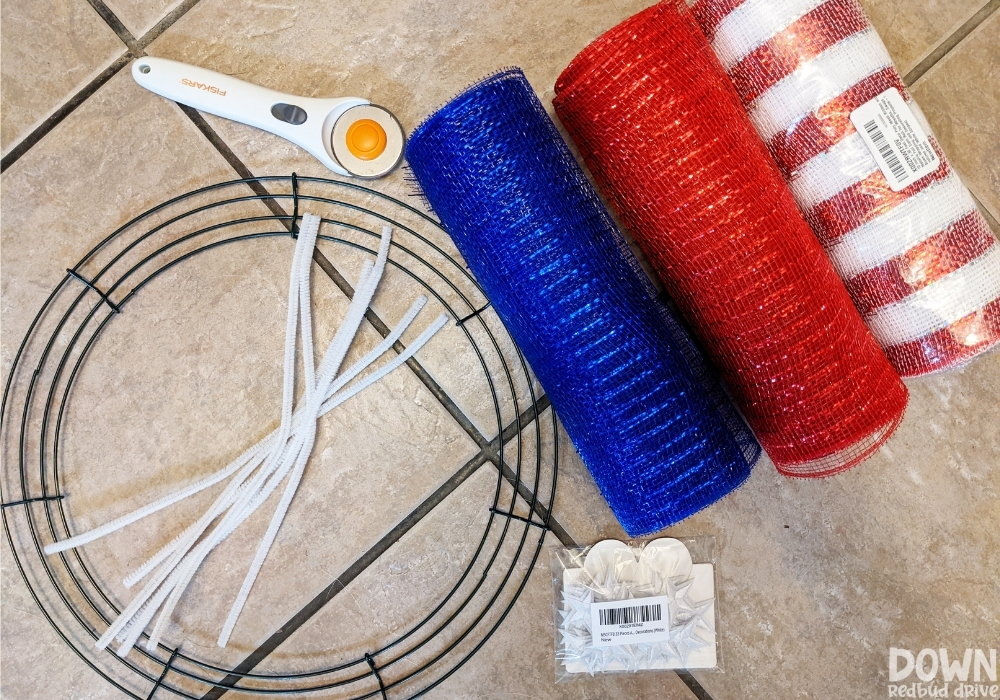 Overhead view of the supplies for the DIY American Flag Mesh Wreath.