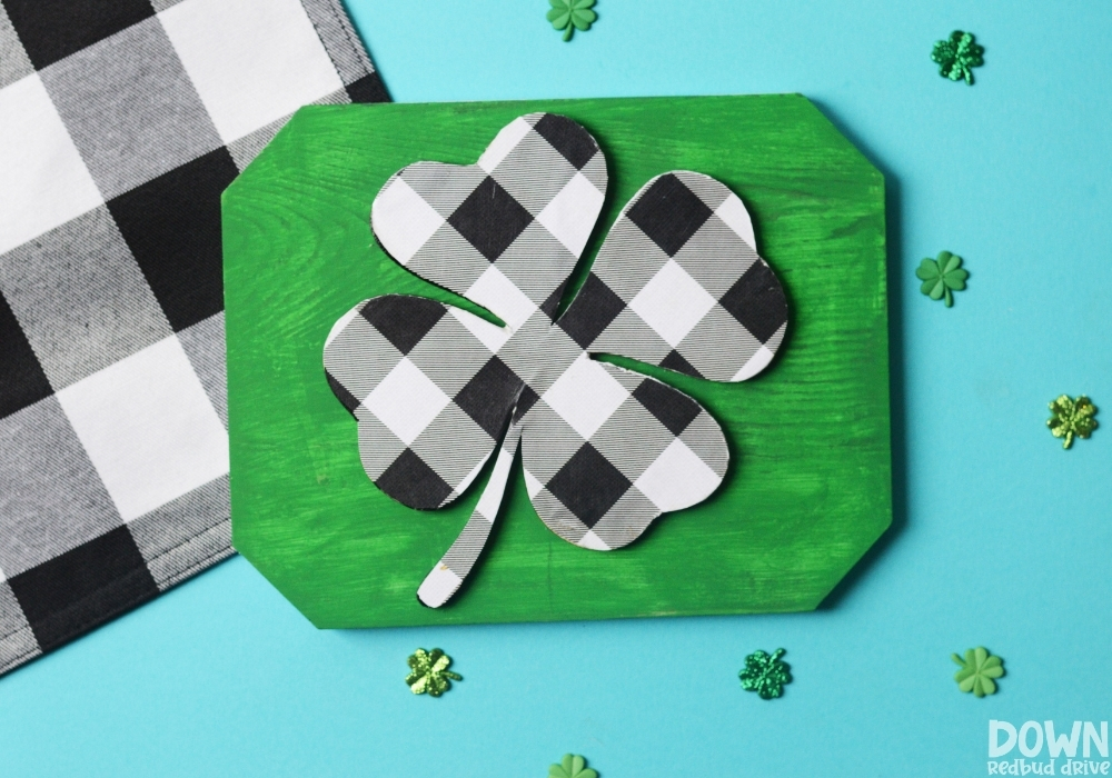 Overhead view of the finished DIY Buffalo Plaid Shamrock Sign