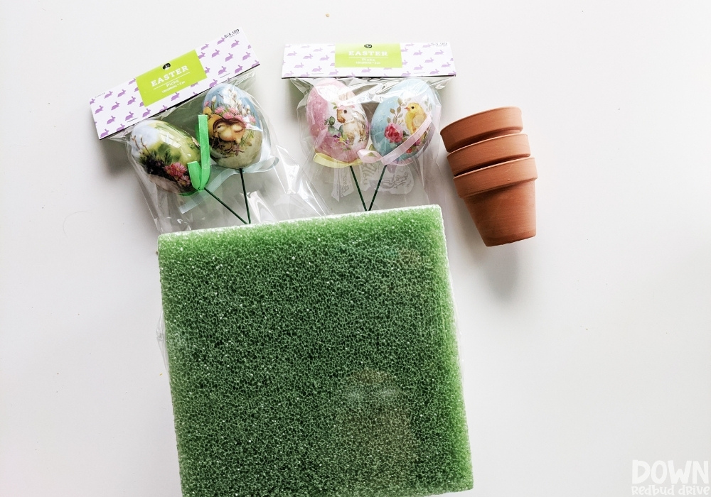 Overhead view of the supplies for the DIY Easter Egg Topiary.