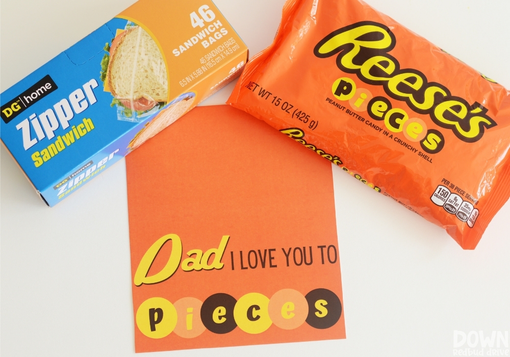 Overhead view of the supplies for the DIY Father's Day Reese's Pieces Gift.