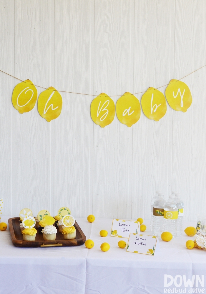 Tall picture of the decorations for the DIY Lemon Baby Shower.