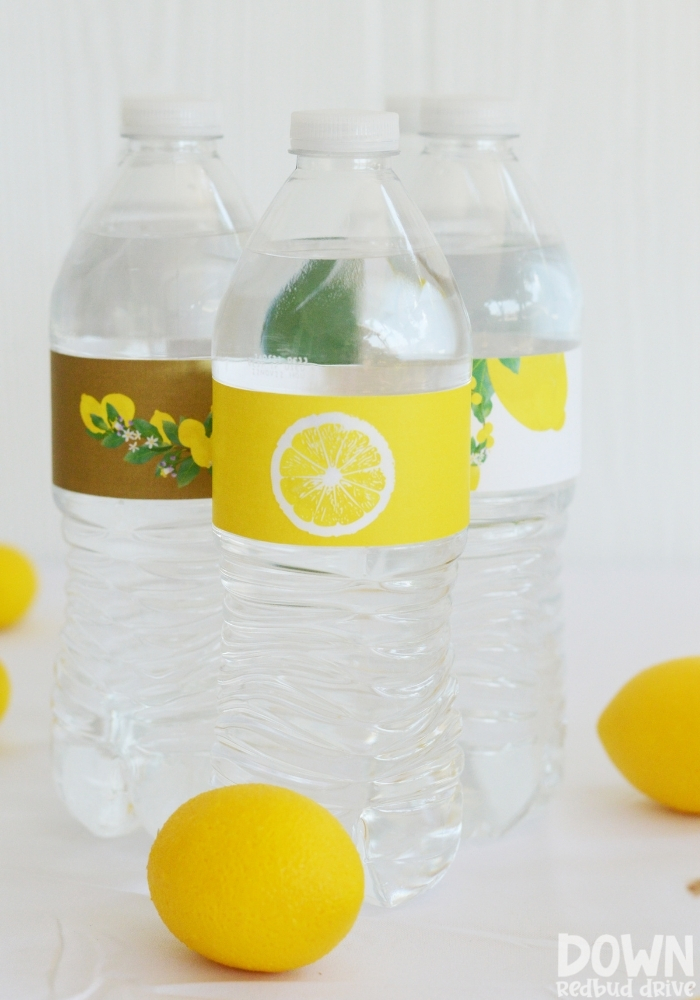 Close up tall image of the lemon themed water bottles.