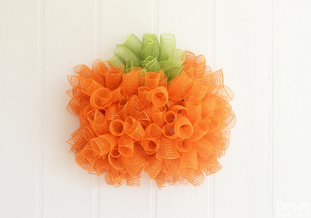 The finished DIY Mesh Pumpkin Wreath.