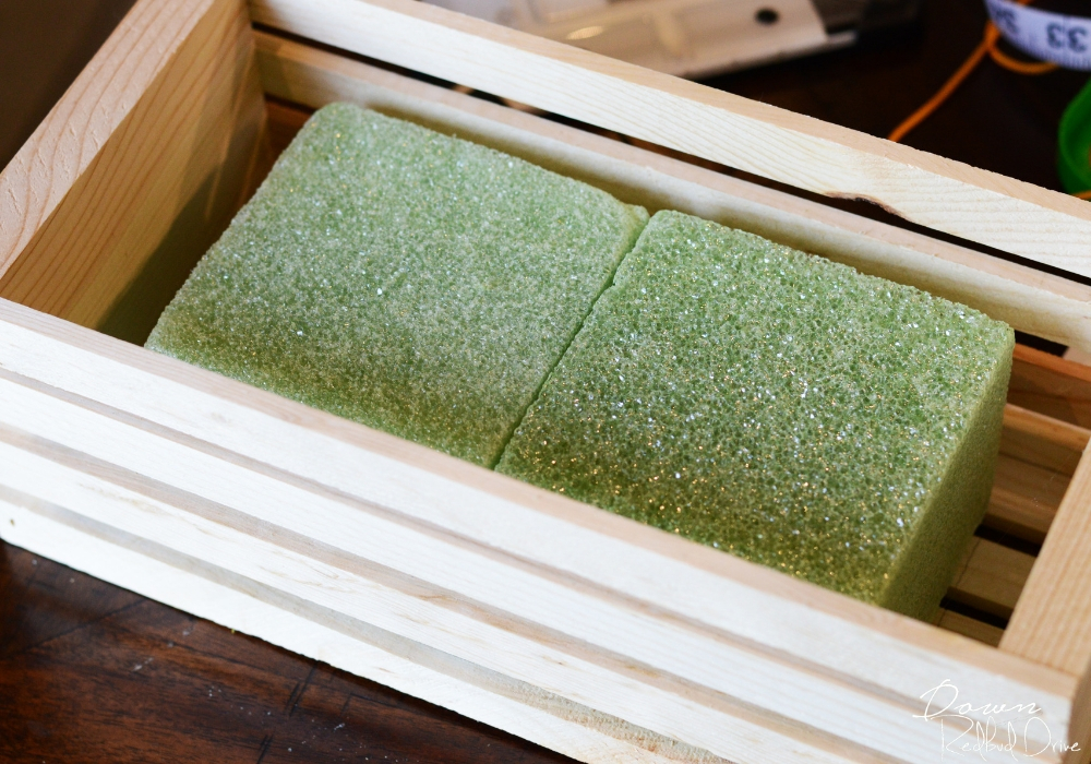 floral foam in a wooden crate