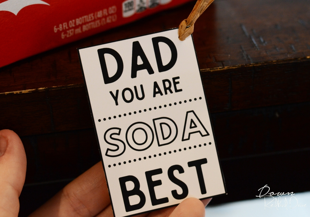 dad you are soda best tag being held by a hand