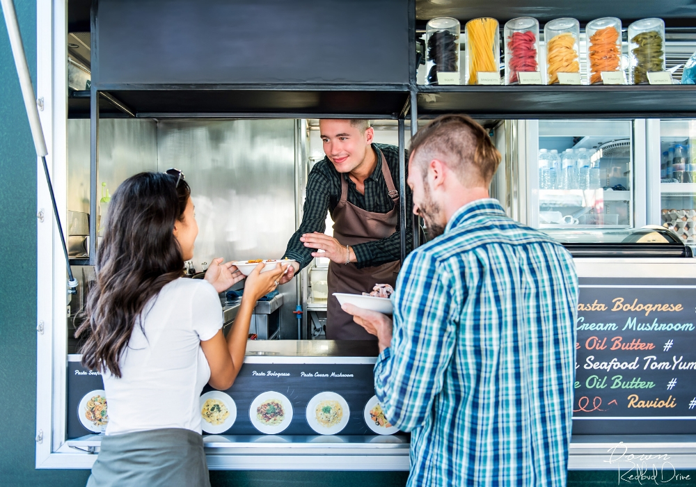 couple ordering food at a food truck