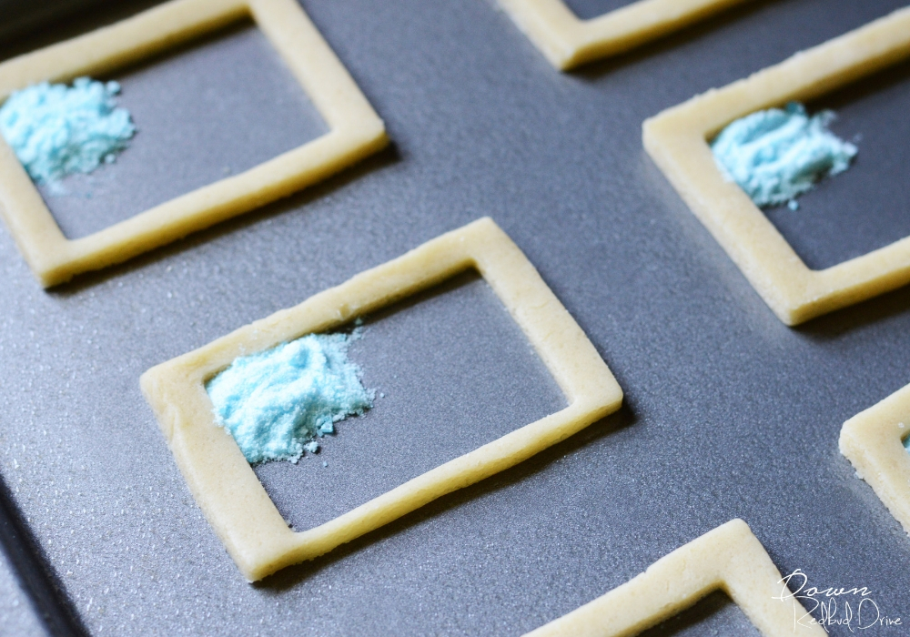 crushed blue candy inside a rectangle cookie