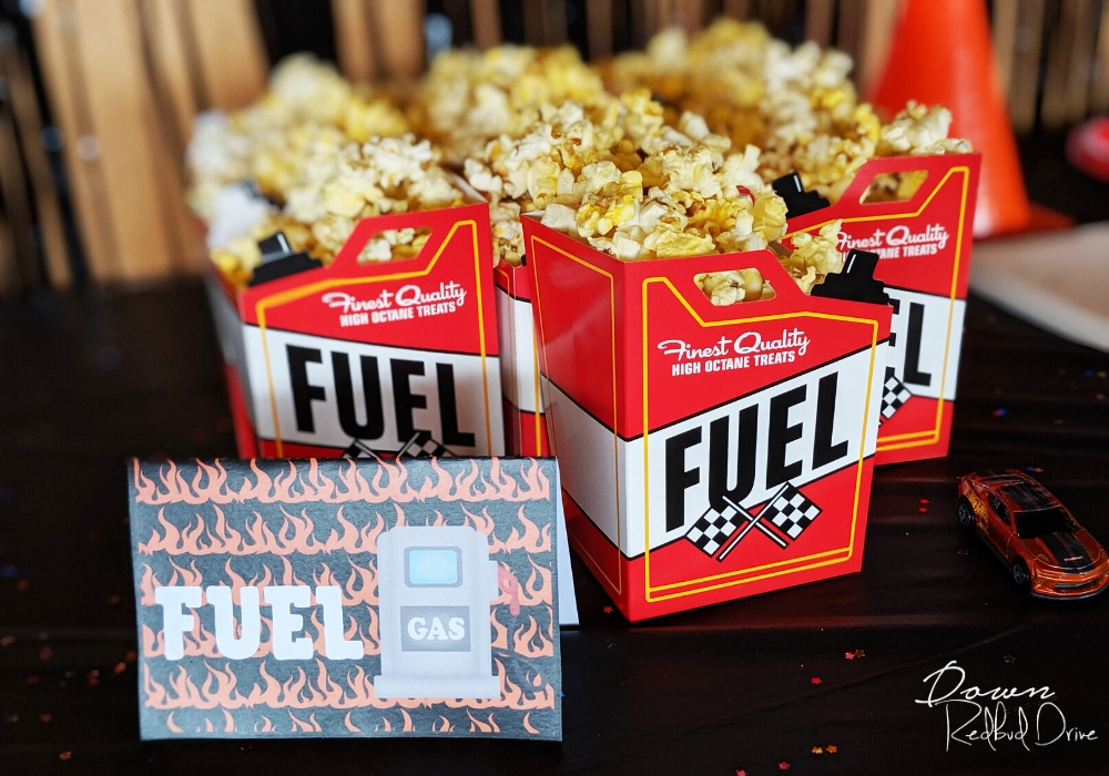 popcorn in serving containers that look like fuel cans