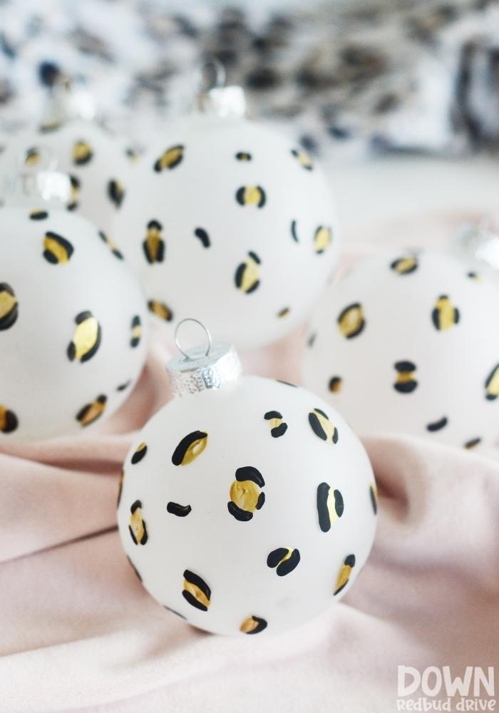 A tall closeup of the finished Leopard Christmas Ornaments .