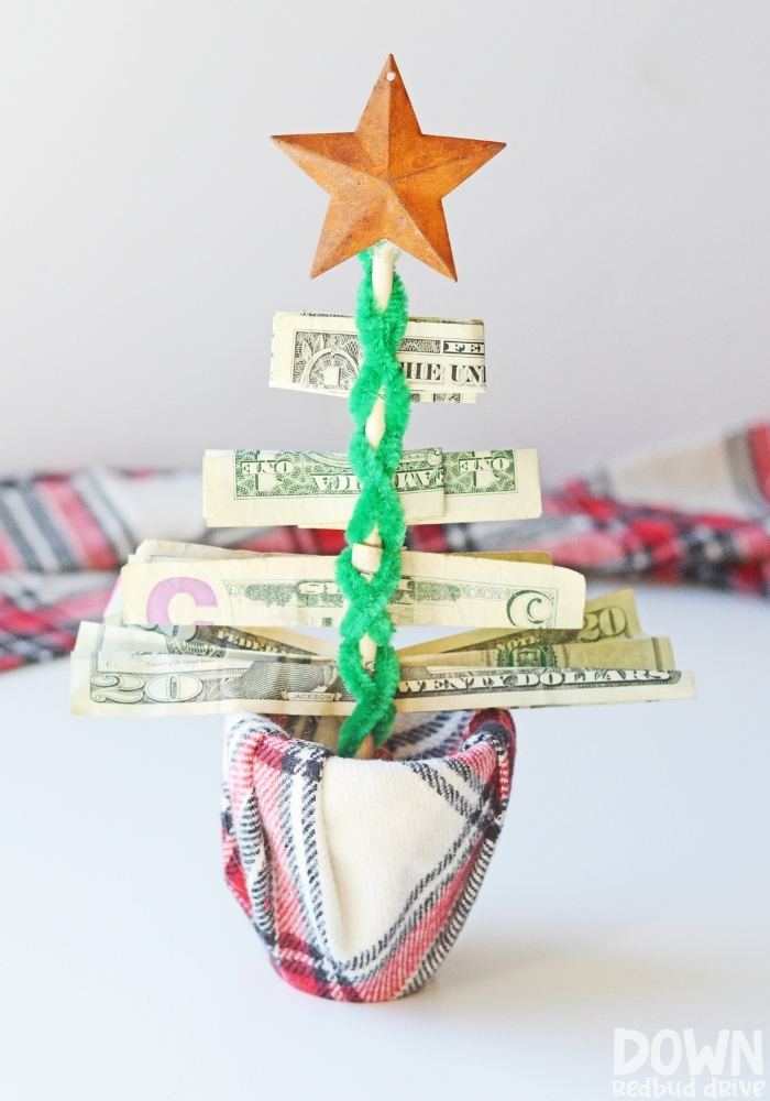 Portrait image of the finished money Christmas tree gift DIY.