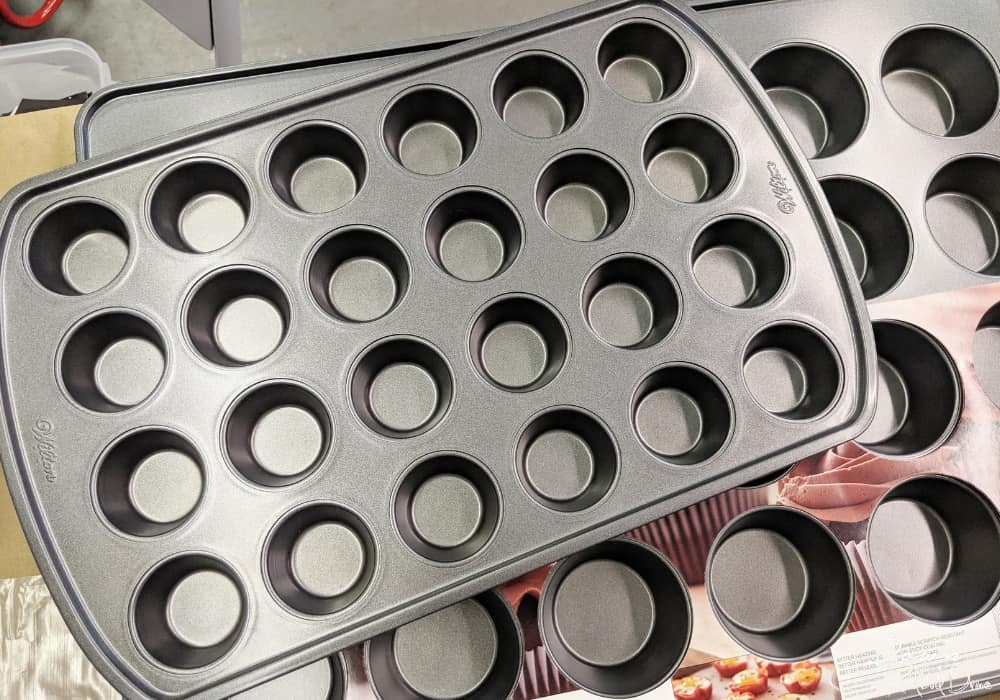 a mini muffin tin with a regular muffin tin