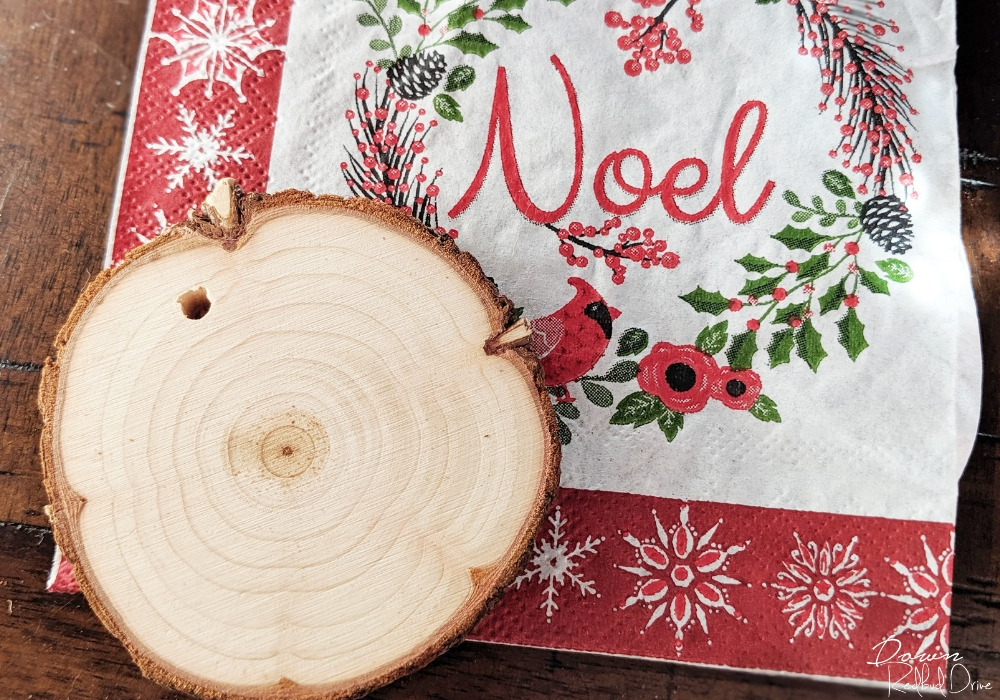 wood slice ornament with a christmas napkin