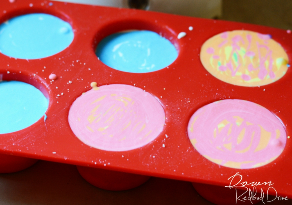 filling the pan with batter for no bake cheesecakes