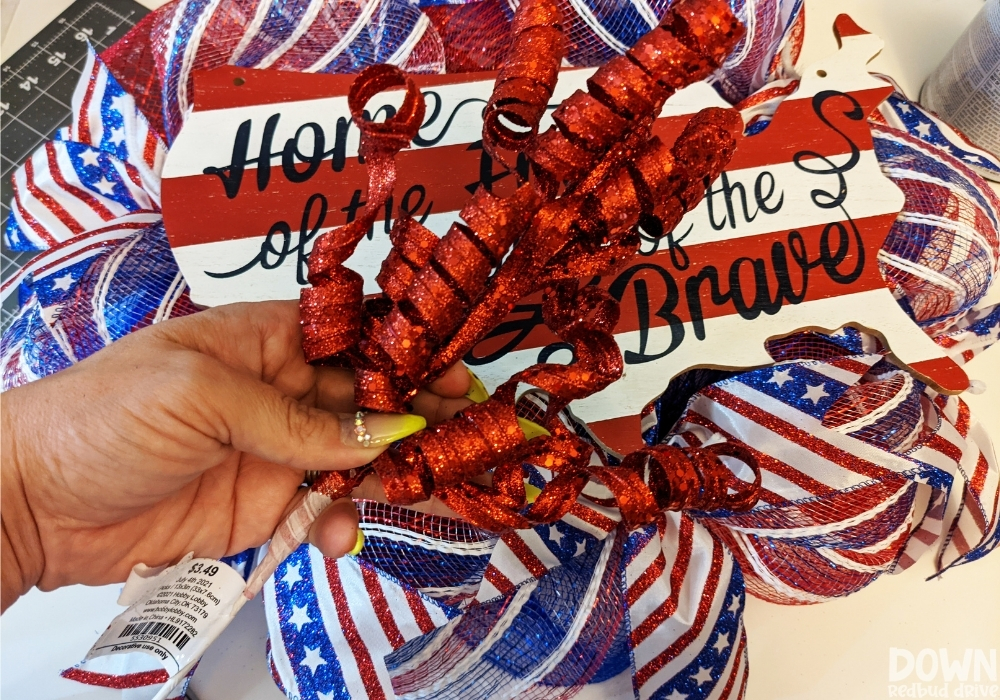 Red wreath picks for the Patriotic Deco Mesh Wreath.