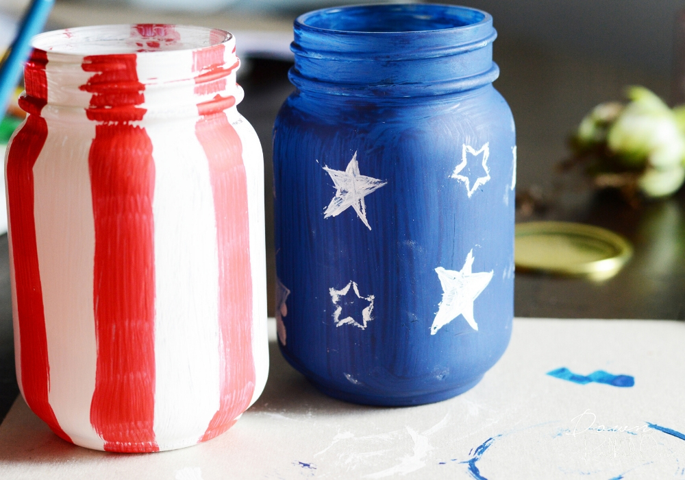 Painting the jars to make Patriotic Succulent Planters