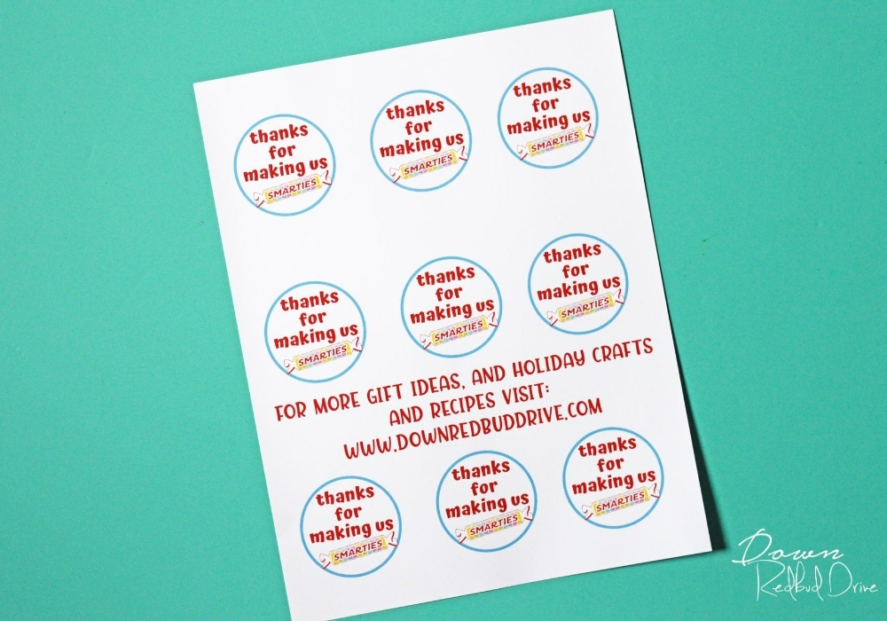 Overhead shot of uncut "thanks for making us smarties" printable gift tags.