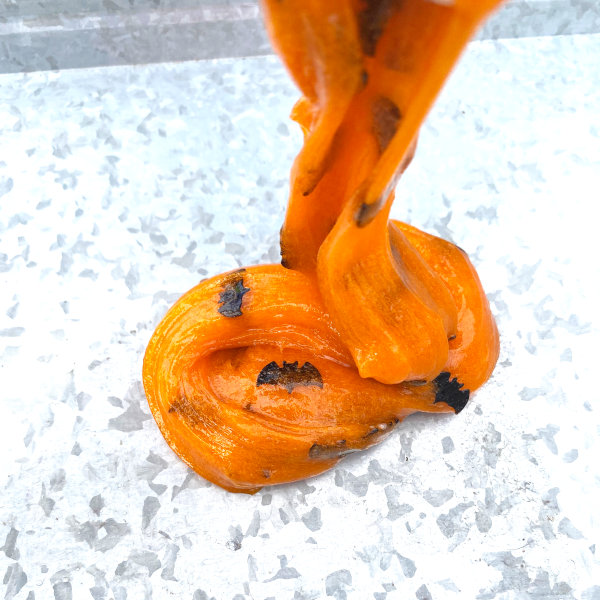 Finished orange halloween themed slime recipe.