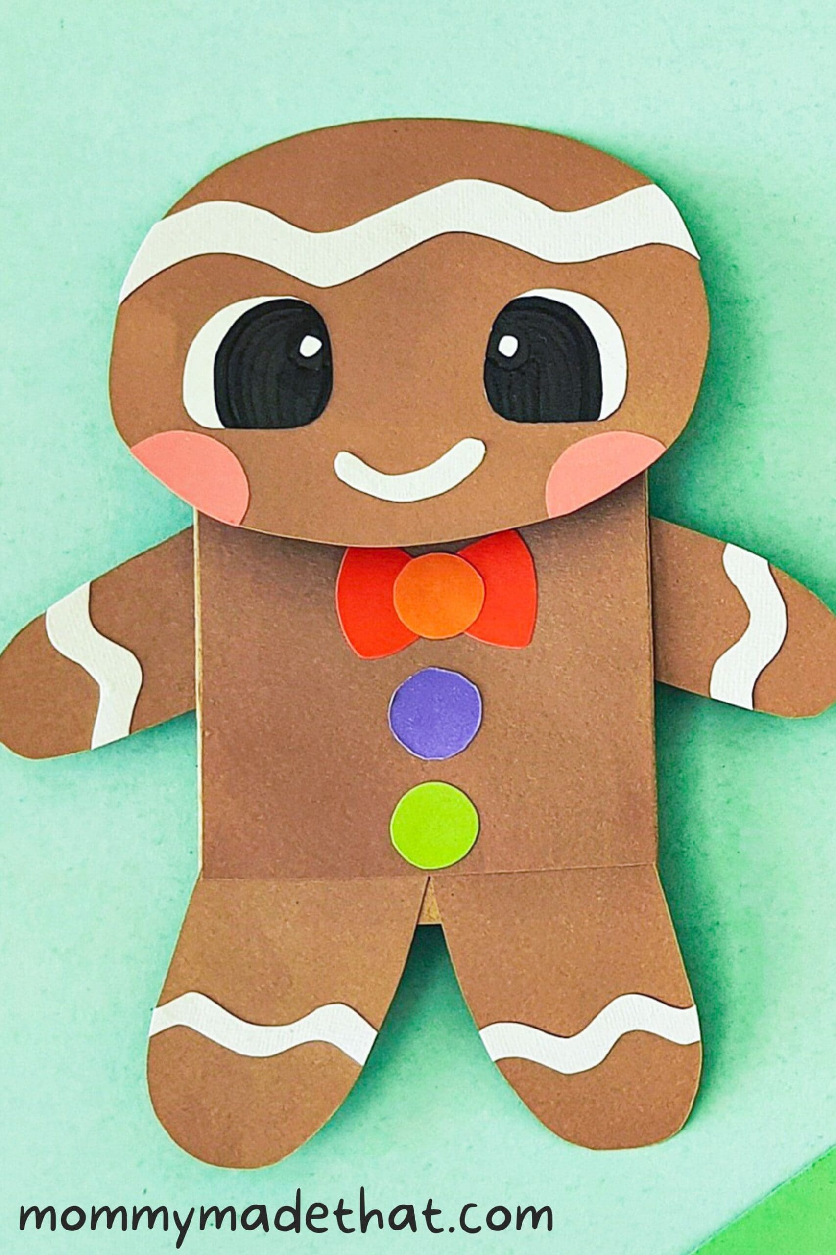 a finished gingerbread puppet made from a paper bag.